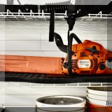 T04. Husqvarna 450 chainsaw. 